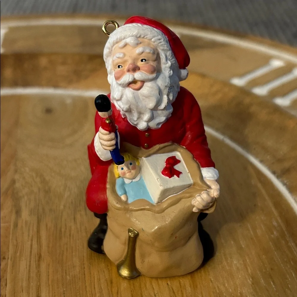 Hallmark Christmas tree ornament trio: 1991 Santa, 2000 chair, 2001 snowman